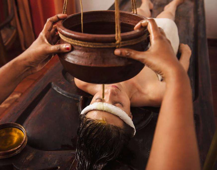 Experience Shirodhara at Orthoplus Bone and Joint Center—a soothing Ayurvedic therapy that involves warm oil pouring on the forehead to relieve stress, enhance mental clarity, and promote relaxation.